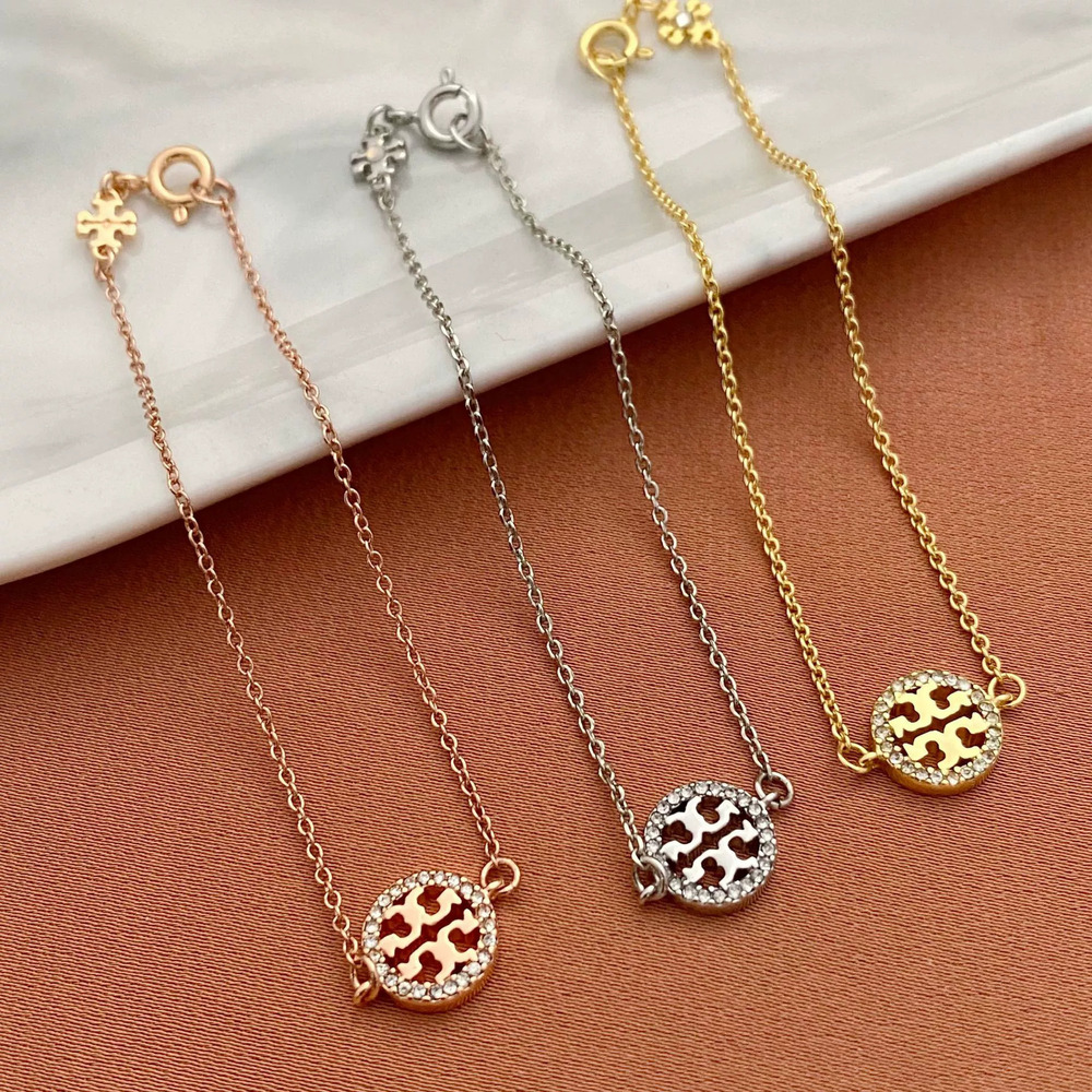 Tory Burch Rhinestone Cutout Alphabet Geometric Round Metal Bracelet